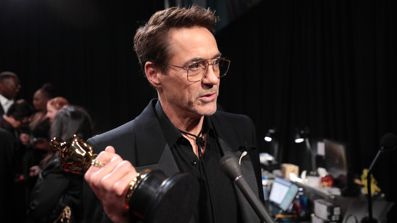Robert Downey Jr. holding Oscar