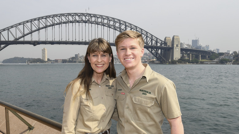 Terri Irwin smiles while posing with her son Robert Irwin