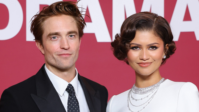 Robert Pattinson and Zendaya smiling