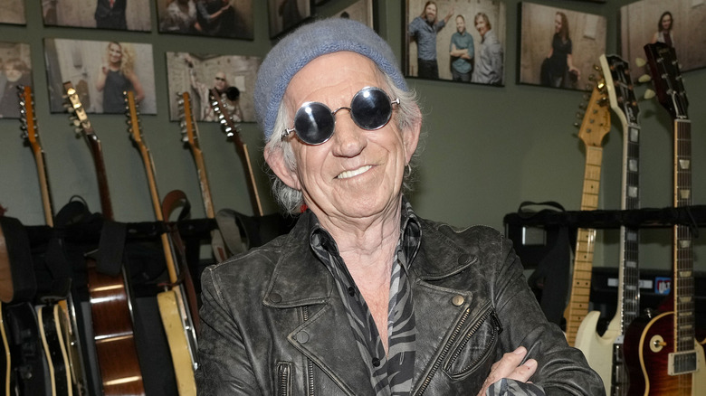 Keith Richards posing in sunglasses