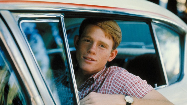 Ron Howard posing on the set of American Graffiti