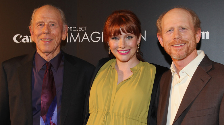 Rance Howard, Bryce Dallas Howard, and Ron Howard smiling together