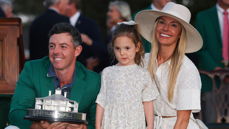 Rory McIlroy,  Erica Stoll and their four-year-old daughter Poppy after McIlroy won the 89th Masters