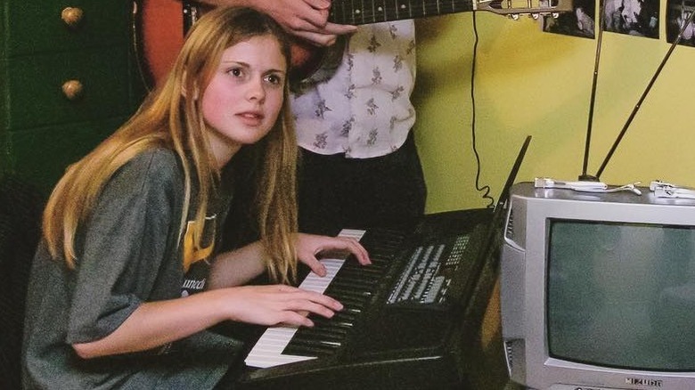 Young Rose McIver playing piano