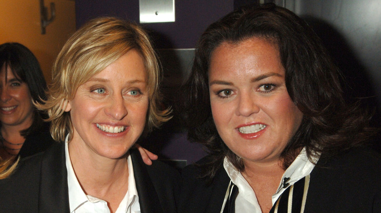 Ellen DeGeneres and Rosie O'Donnell smiling together at event