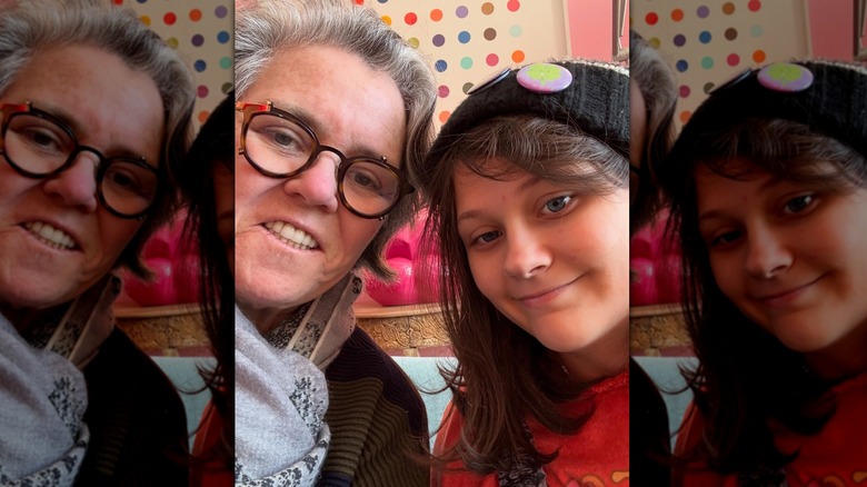 Rosie O'Donnell and her child, Clay, posing and smiling with their heads close together