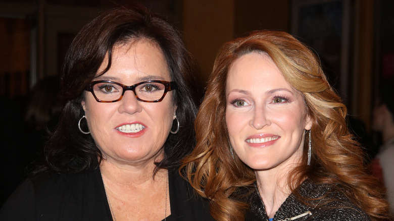 Closeup of Rosie O'Donnell and Michelle Rounds smiling together at event