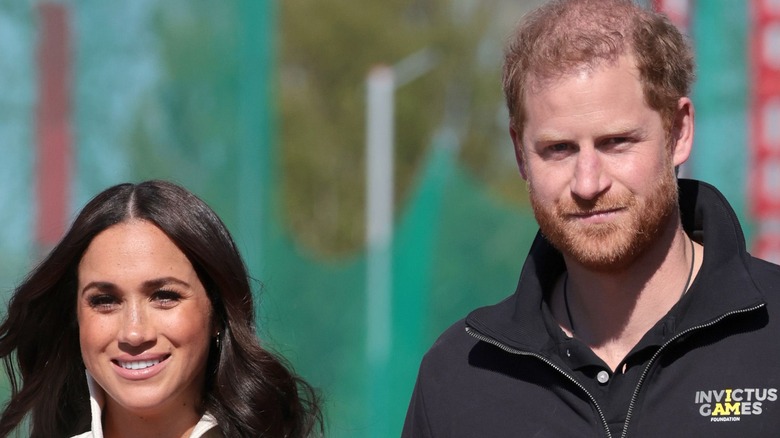 Prince Harry and Meghan Markle walking