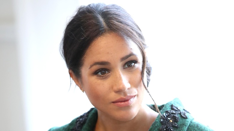 Meghan Markle listening during an interview
