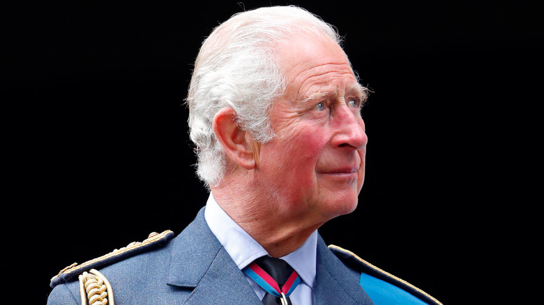 King Charles looking up in his military uniform