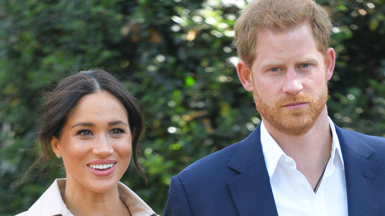 Prince Harry and Meghan Markle walking