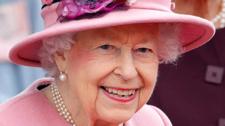 Queen Elizabeth smiling for photo