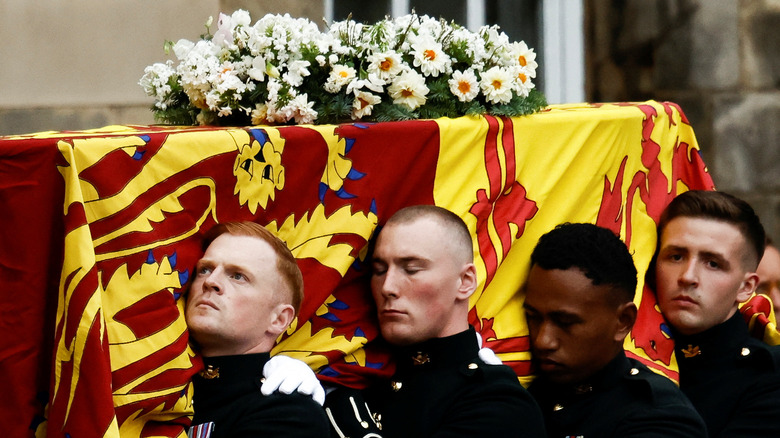Pallbearers carry the coffin of Britain's Queen Elizabeth II's coffin