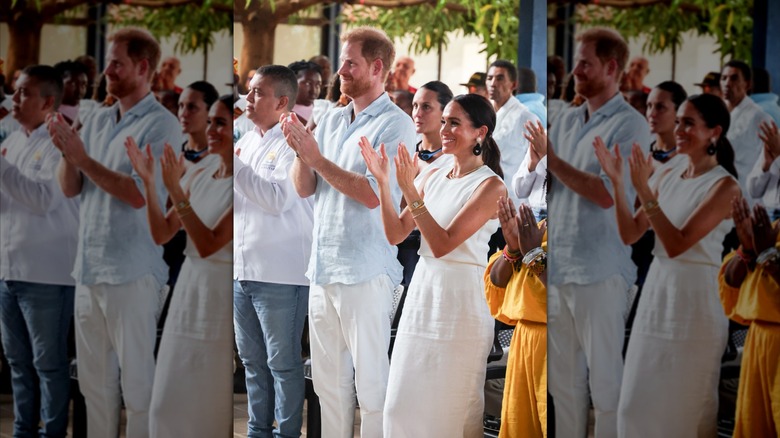 Prince Harry and Meghan, Duchess of Sussex smile at San Basilio de Palenque during their Colombia visit in Cartagena, Colombia (2024)