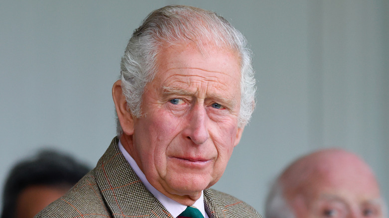 King Charles in green tie