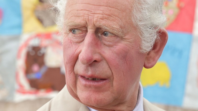 Prince Charles looking backwards
