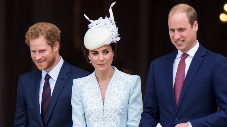 Prince Harry, Kate Middleton, and Prince William smiling