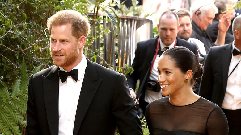 Prince Harry and Meghan Markle smile