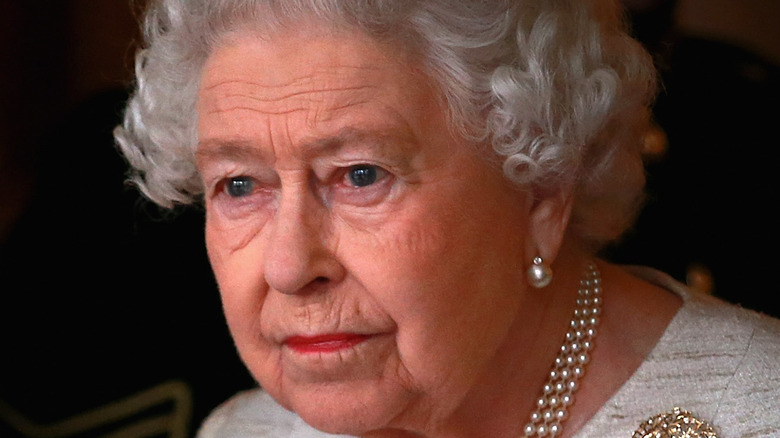 Queen Elizabeth frowning