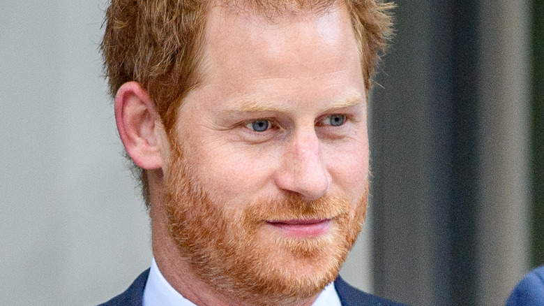 Prince Harry poses for a photograph. 