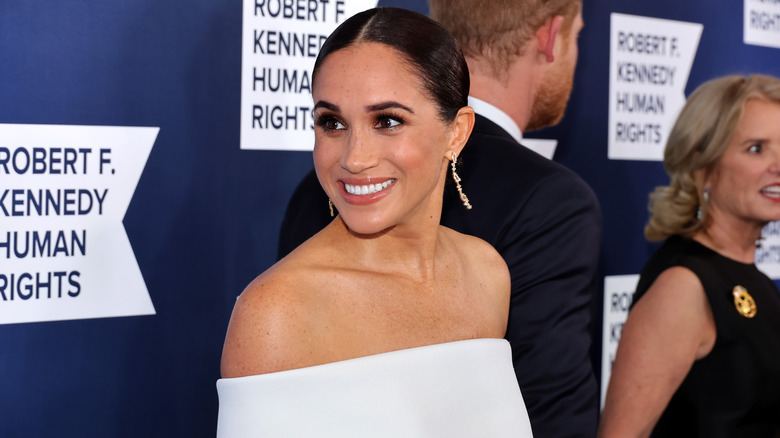 meghan markle smiling white dress