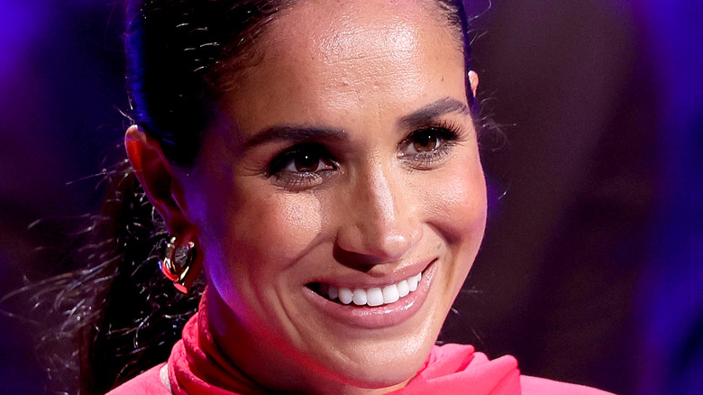 Meghan Markle speaking onstage at an event