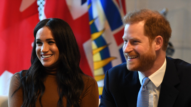 Prince Harry and Meghan Markle smiling 