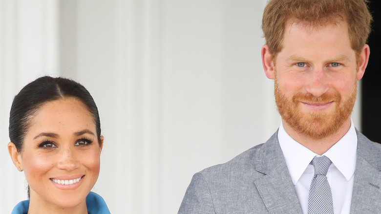 Prince Harry and Meghan Markle smiling 