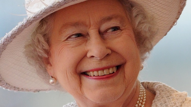 Queen Elizabeth poses for a photo 