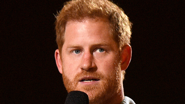 Prince Harry speaks onstage at the Vax Live event