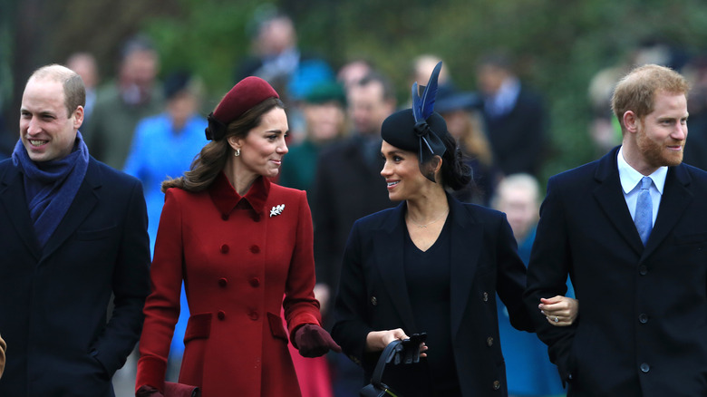 Princes William and Harry with their wives