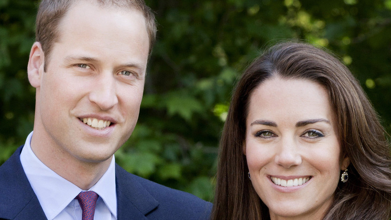 Prince William and Kate Middleton pose for a photo. 