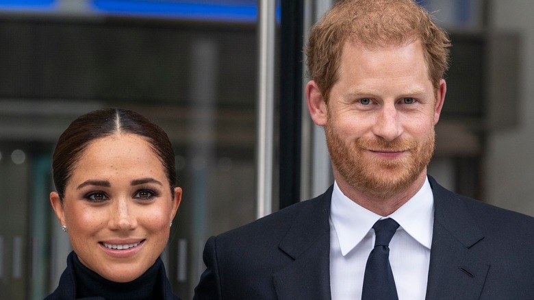 Meghan Markle and Prince Harry posing