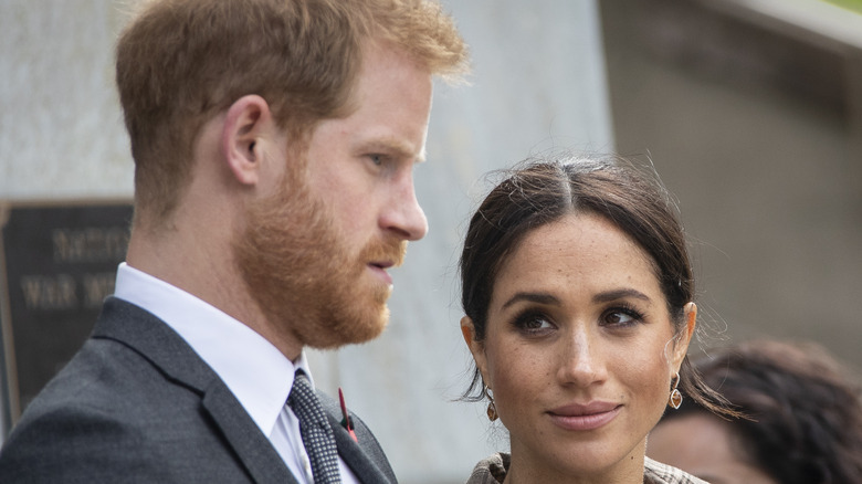 Meghan Markle and Prince Harry posing