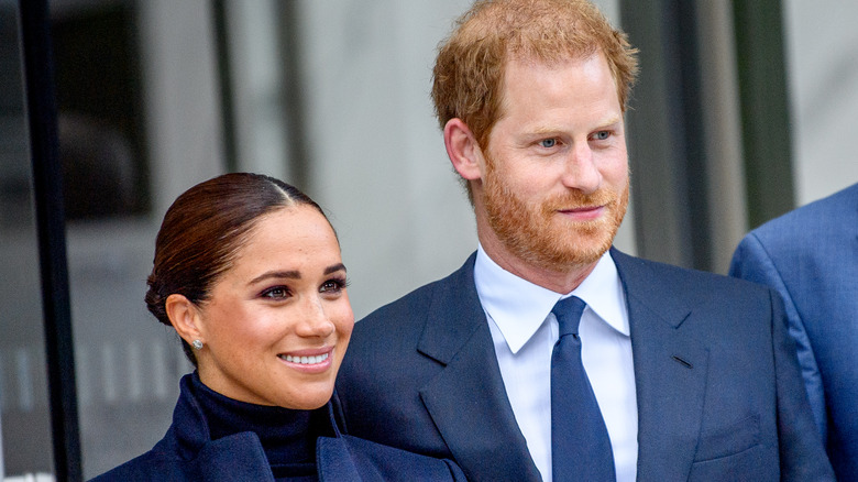 Harry and Meghan smiling