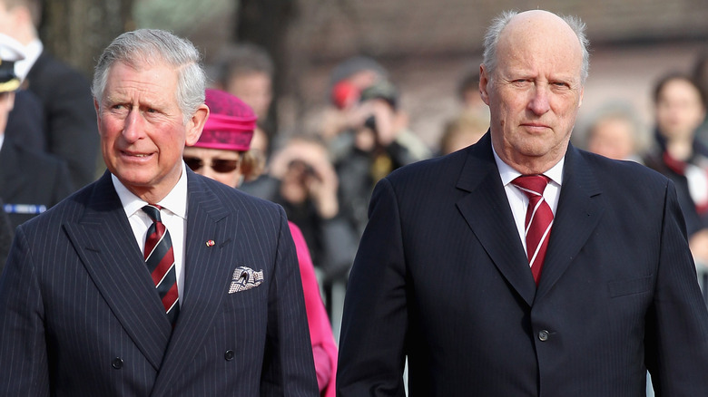 King Charles III walking with King Harald V