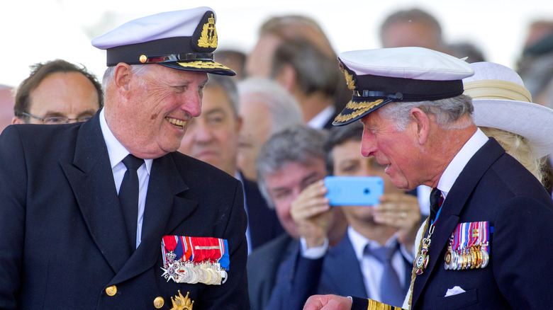 King Charles III laughing with King Harald V