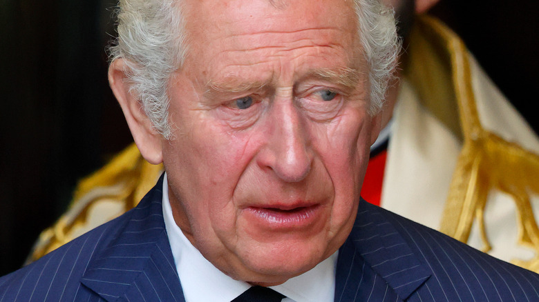 king charles III looking sad