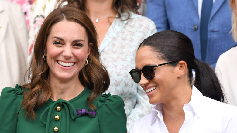 Kate Middleton and Meghan Markle enjoy a laugh