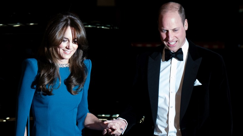 Kate Middleton and Prince William holding hands