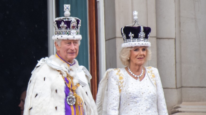 King Charles III and Queen Camilla with crowns