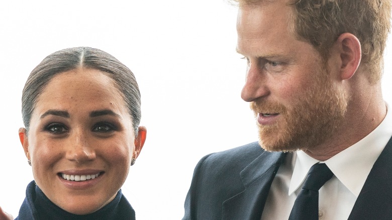 Prince Harry and Meghan Markle standing together