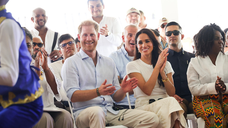 Meghan Markle and Prince Harry clapping during their 2024 trip to Colombia