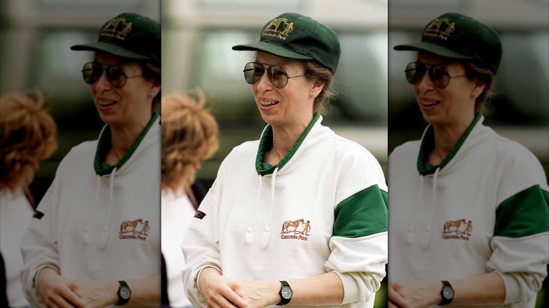 Princess Anne at Gatcombe Park in aviators and a cap