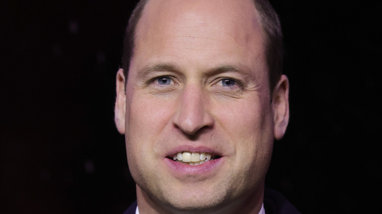 Prince William smiling at event 