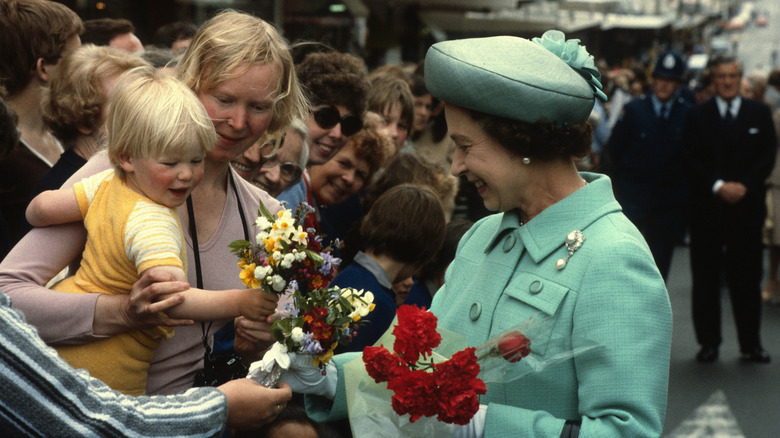 Queen Elizabeth II greeting members of the public