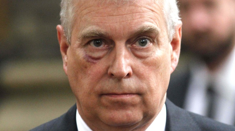 Prince Andrew looks pensive