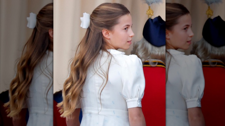 Princess Charlotte turning with her back to the camera