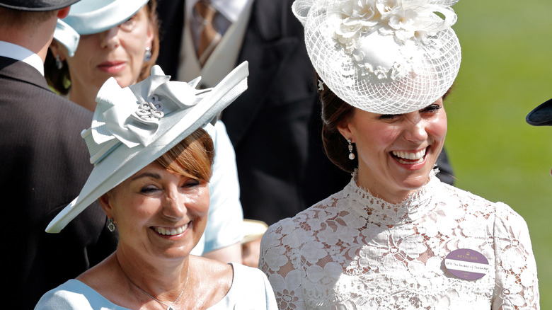 Carole Middleton and Princess Catherine smiling together 