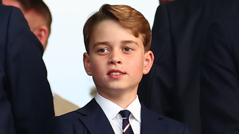 Prince George attending a soccer match